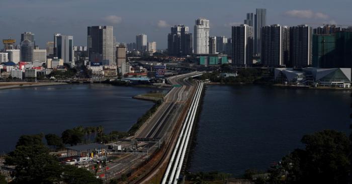 A view of the empty Woodlands Causeway between Singapore and Malaysia after Malaysia imposed a