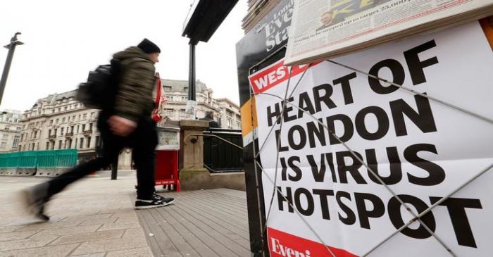 FILE PHOTO: Newspaper headline on display at Oxford Circus in London