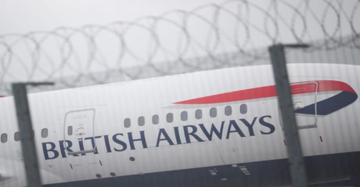 Parked British Airways planes are seen at Heathrow Airport in London