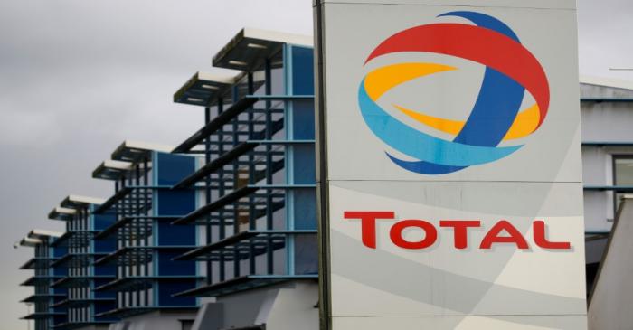 The logo of a French oil giant Total is seen at the refinery in Donges