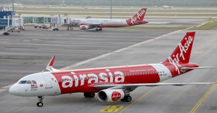 AirAsia planes are seen on the tarmac of Kuala Lumpur International Airport 2 (KLIA2) in Sepang