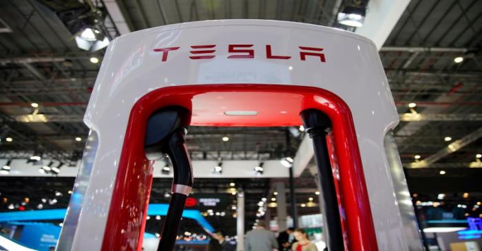 FILE PHOTO: Tesla charging station is pictured during the media day for the Shanghai auto show
