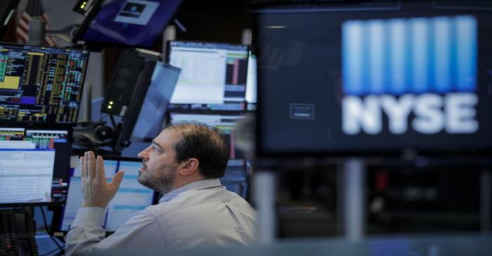 A trader works on the floor of the NYSE in New York