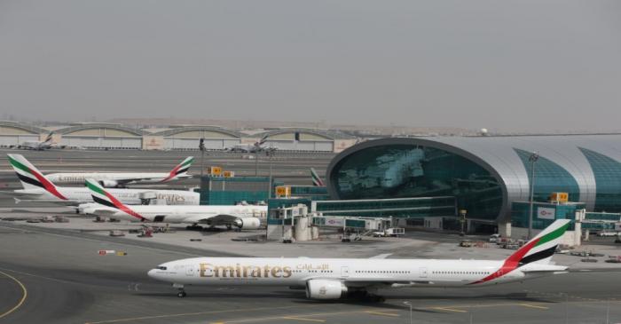 Emirates Airline planes are seen at Dubai International Airport in Dubai