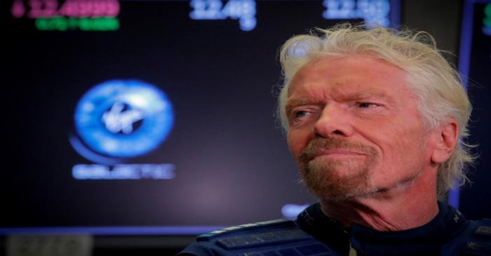 FILE PHOTO: Sir Richard Branson stands on the floor of the New York Stock Exchange ahead of the
