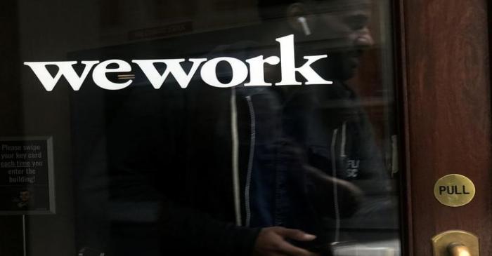 A man walks out of a WeWork space in the Manhattan borough of New York City