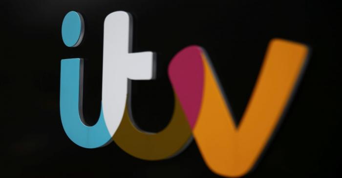 FILE PHOTO: A company sign is displayed outside an ITV studio in London