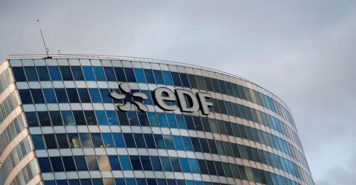 A logo of French electric company EDF is seen at an office building in La Defense business