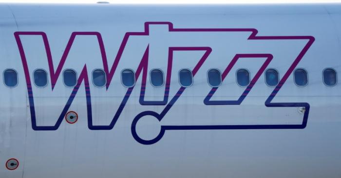 FILE PHOTO: Wizz Air Airbus 321-231 HA-LXJ aircraft taxis to runway at the Chopin International