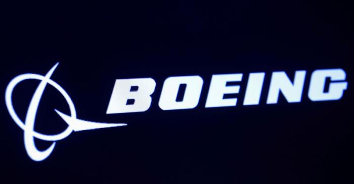 FILE PHOTO: The company logo for Boeing is displayed on a screen on the floor of the NYSE in