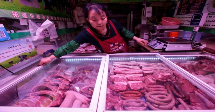 Pork for sale is seen at Sanyuanli market  in Beijing