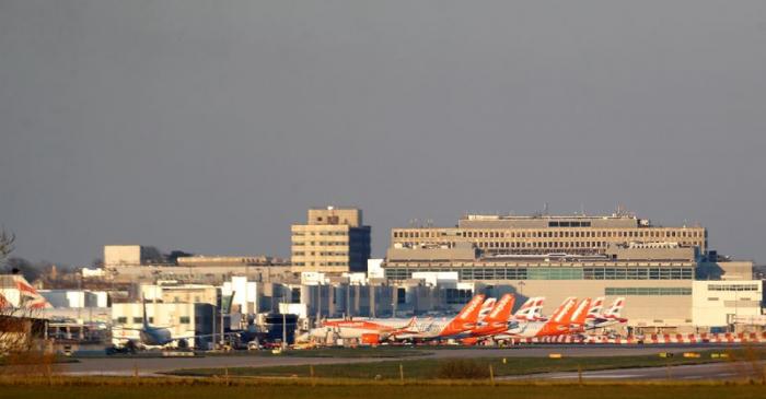 FILE PHOTO: Easyjet and British Airways planes are pictured at Gatwick airport