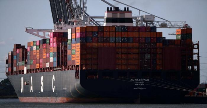 FILE PHOTO: Shipping containers stacked on a cargo ship are seen in the dock at the ABP port in