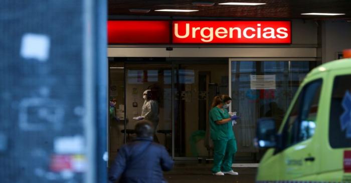 FILE PHOTO: Healthcare workers are pictured at the entrance of the emergency unit at La Paz