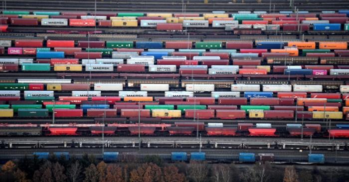 Containers are loaded on freight trains at the railroad shunting yard in Maschen near Hamburg