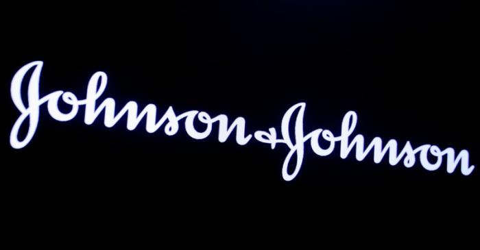 FILE PHOTO: The company logo for Johnson & Johnson is displayed on a screen to celebrate the