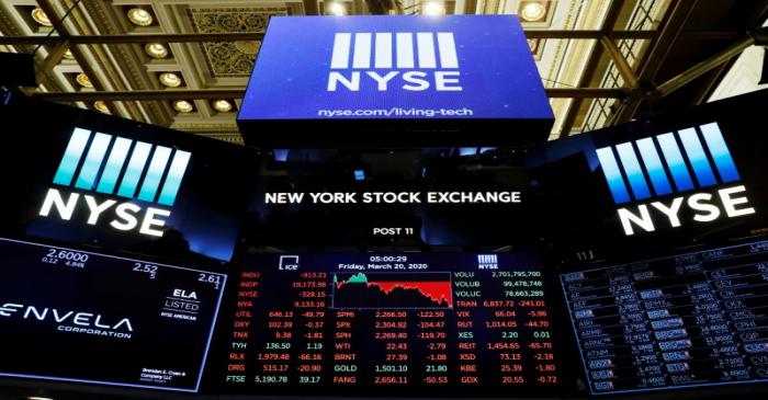 FILE PHOTO: The final numbers of the day are displayed above the floor of the New York Stock
