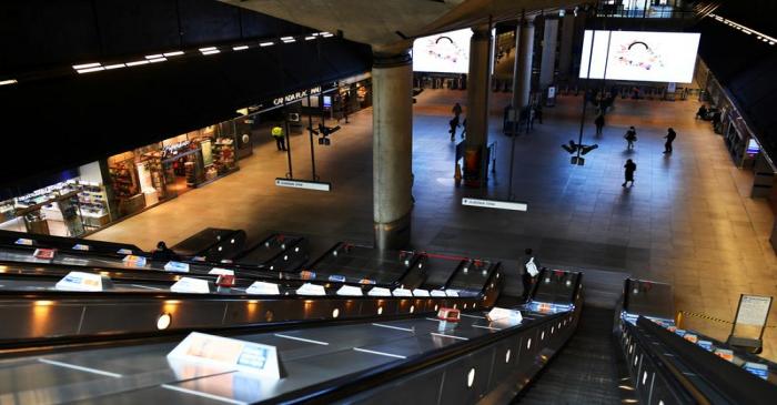 A usually crowded Canary Wharf is seen at lunchtime in London