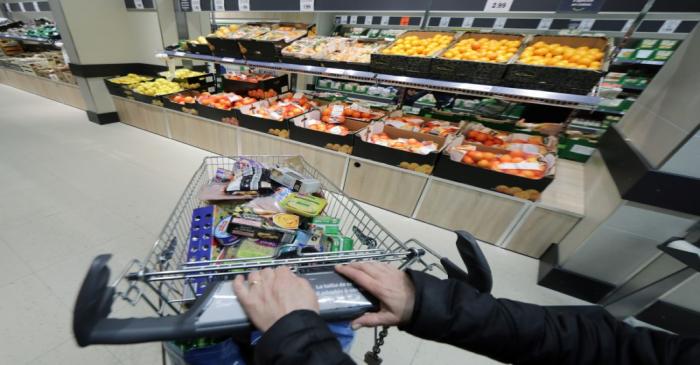 A customer shops in a Lidl supermarket in Nice