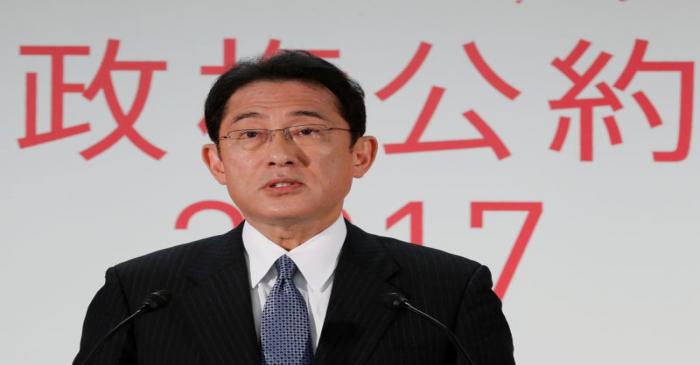 Japan's ruling Liberal Democratic Party policy chief Fumio Kishida speaks during a news