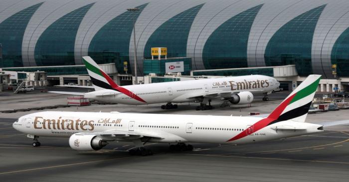 FILE PHOTO: Emirates Airline Boeing 777 planes at are seen Dubai International Airport in Dubai