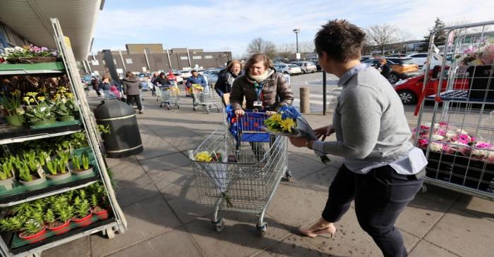 FILE PHOTO: Tesco supermarket in Newcastle-under-Lyme hand out flowers to NHS workers as they