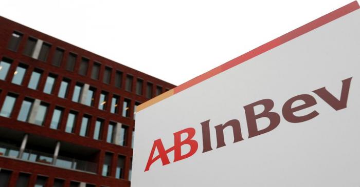 FILE PHOTO: The logo of AB InBev outside the brewer's headquarters in Leuven