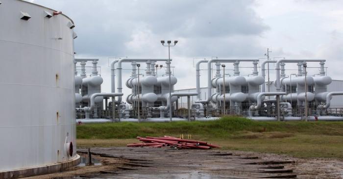 FILE PHOTO: An oil storage tank and crude oil pipeline equipment is seen during a tour by the