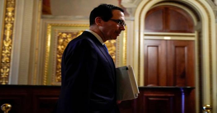 FILE PHOTO: FILE PHOTO-U.S. Secretary of the Treasury Mnuchin walks to the meeting for a