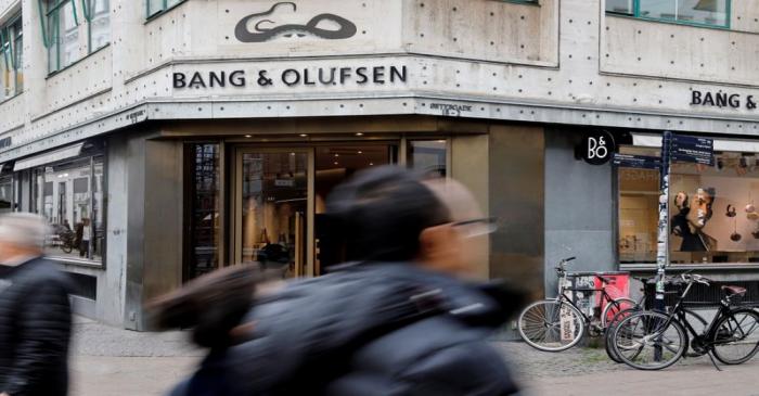 FILE PHOTO: People walk past Bang & Olufsen flagship store in Copenhagen