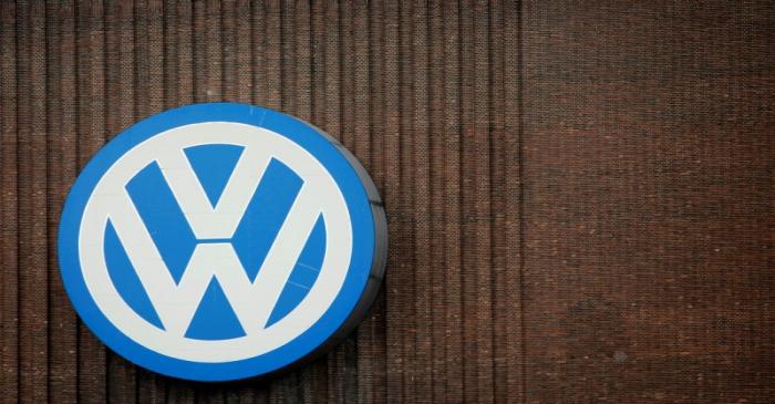 A giant logo of Volkswagen is pictured on the wall of its production facility in Wolfsburg