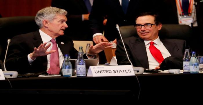 FILE PHOTO: Federal Reserve Chairman Jerome Powell talks with U.S. Treasury Secretary Steven