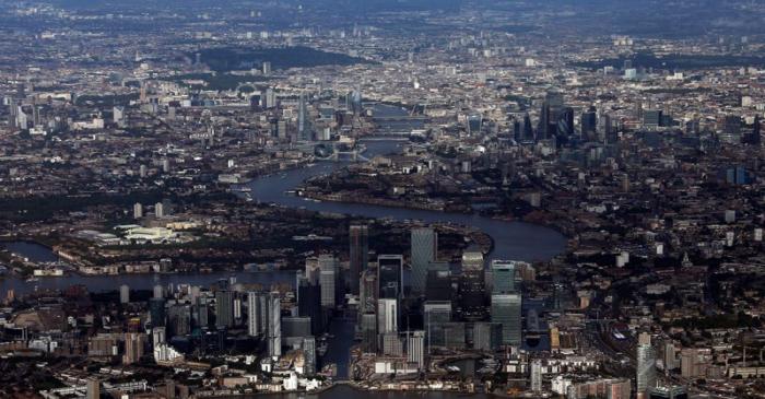 Canary Wharf and the City of London financial district are seen from an aerial view in London