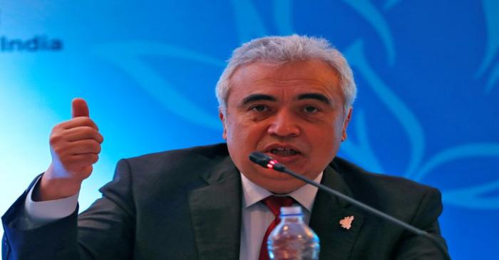FILE PHOTO: Fatih Birol, Executive Director of the International Energy Agency, speaks with the