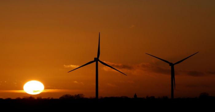 FILE PHOTO: Power-generating windmill turbines are seen at a wind park in Flesquieres