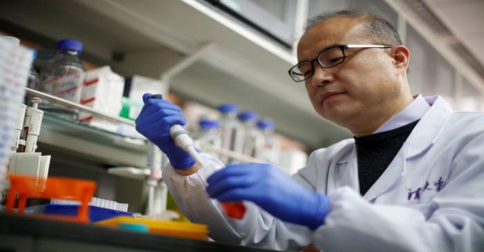 FILE PHOTO: Scientist Linqi Zhang in his laboratory at Tsinghua University's Research Center