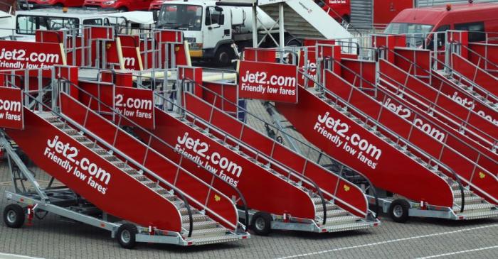 FILE PHOTO: Jet2.com aircraft boarding stairs are stored at Stansted airport in Stansted,