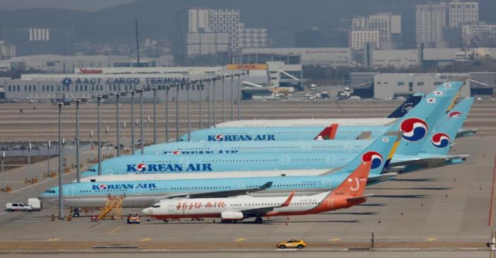 FILE PHOTO: Korean Air's passenger planes are parked following outbreak of COVID-19, at Incheon
