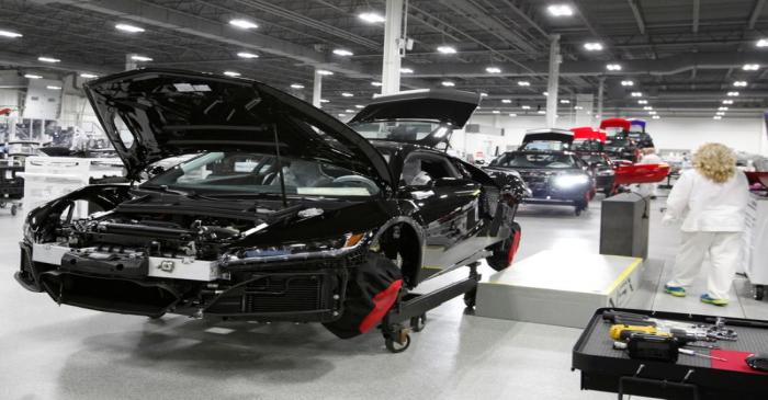 Honda Motor Co's Acura NSX luxury sports cars are seen in assemble line at the company's