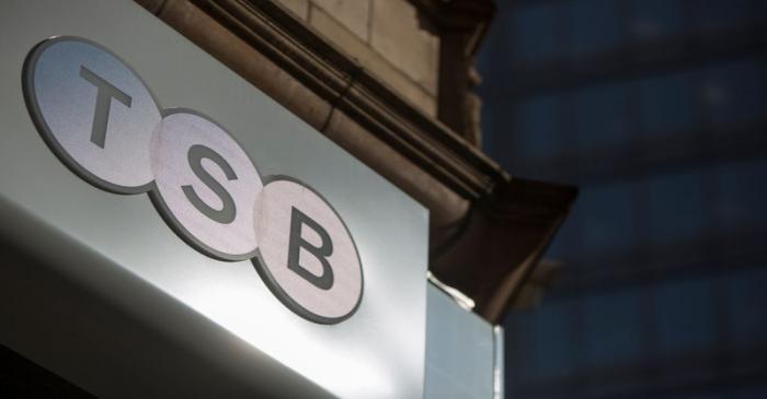 A sign is displayed outside a branch of the TSB bank in central London