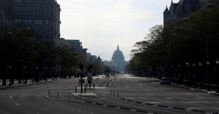 The downtown district of Washington, looking east to the U.S. Capitol, remains largely empty to