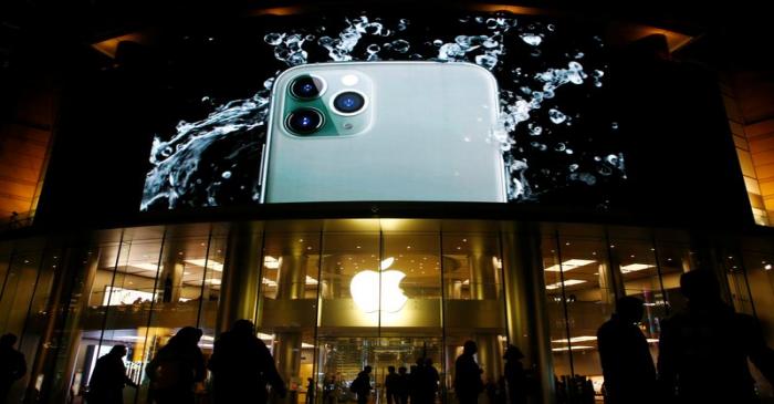 FILE PHOTO:  Screen displaying an advertisement for iPhone 11 Pro is seen outside an Apple