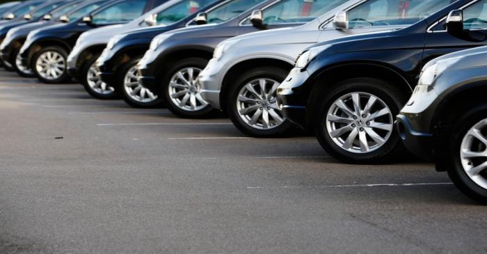 Cars are displayed outside a showroom in west London