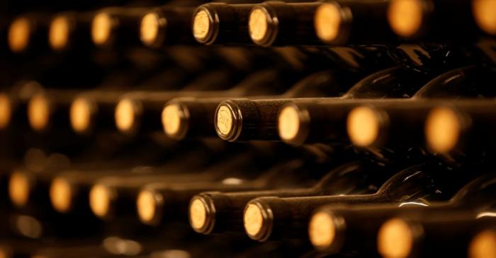 Bottles of red wine are seen in the cellar of Chateau Le Puy in Saint Cibard