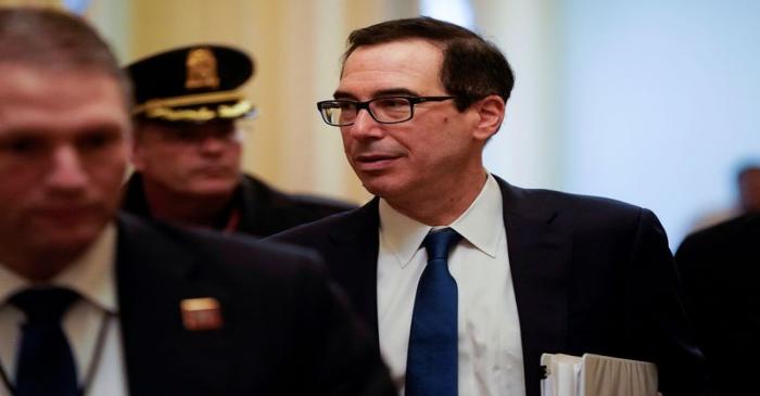 FILE PHOTO: U.S. Secretary of the Treasury Mnuchin walks from a meeting for a coronavirus