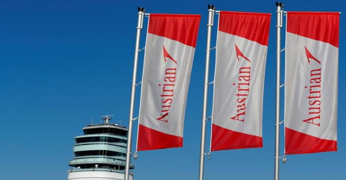 The tower and flags of Lufthansa unit Austrian Airlines are seen at Vienna International