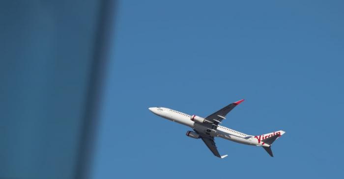 FILE PHOTO: A Virgin Australia Airlines plane takes off from Kingsford Smith International