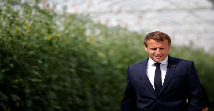 French President Emmanuel Macron meets farmers in Brittany