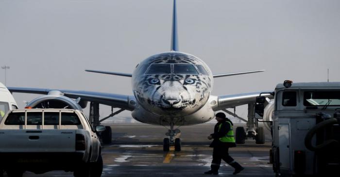 FILE PHOTO: Air Astana Embraer E190-E2 aircraft with a snow leopard livery is seen at Almaty