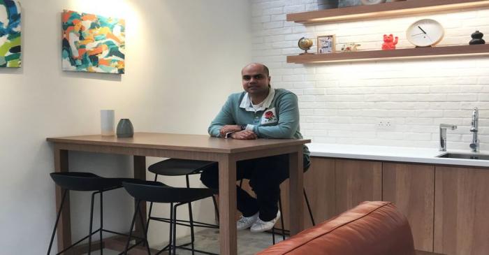 Weave founder and CEO Sachin Doshi poses for a picture at the Weave on Baker co-living space in